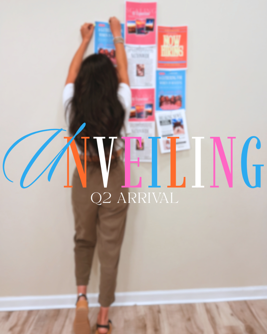 Person hanging up colorful posters on a wall with 'Unveiling Q2 Arrival' text overlay.