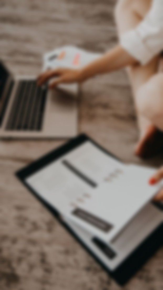 Business owner analyzing digital marketing data and website performance on laptop during marketing audit and strategy planning